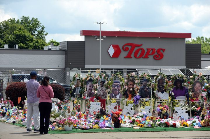 Community members pay respects outside the Tops Friendly Market in Buffalo, New York, in July 2022.