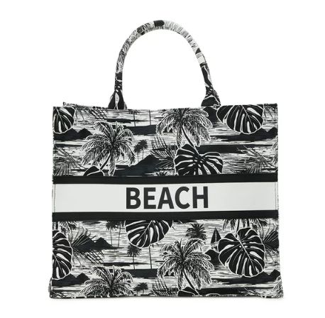 A black and white canvas tote that lets the world know where you’re going