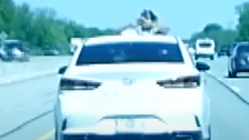 Dashcam Video Captures Passenger Aiming Gun At Car Behind Them