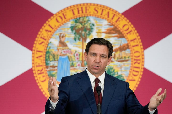 FILE - Florida Gov. Ron DeSantis speaks during a news conference to sign several bills related to public education and increases in teacher pay, in Miami, Tuesday, May 9, 2023. DeSantis and former President Donald Trump will share the spotlight in Iowa on Saturday, May 13, providing a chance to sway influential conservative activists and contrast their campaign styles in Republicans' leadoff voting state. (AP Photo/Rebecca Blackwell)
