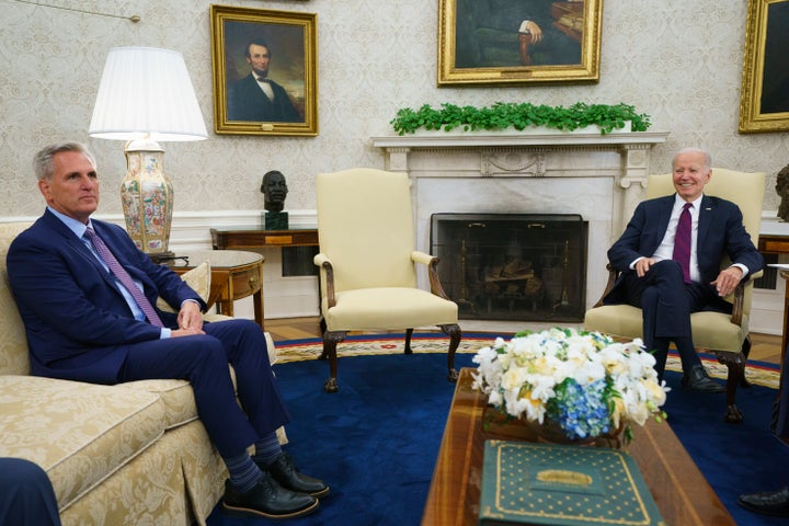 FILE - Speaker of the House Kevin McCarthy of Calif., left, listens as President Joe Biden speaks before a meeting on the debt limit in the Oval Office of the White House, Tuesday, May 9, 2023, in Washington.