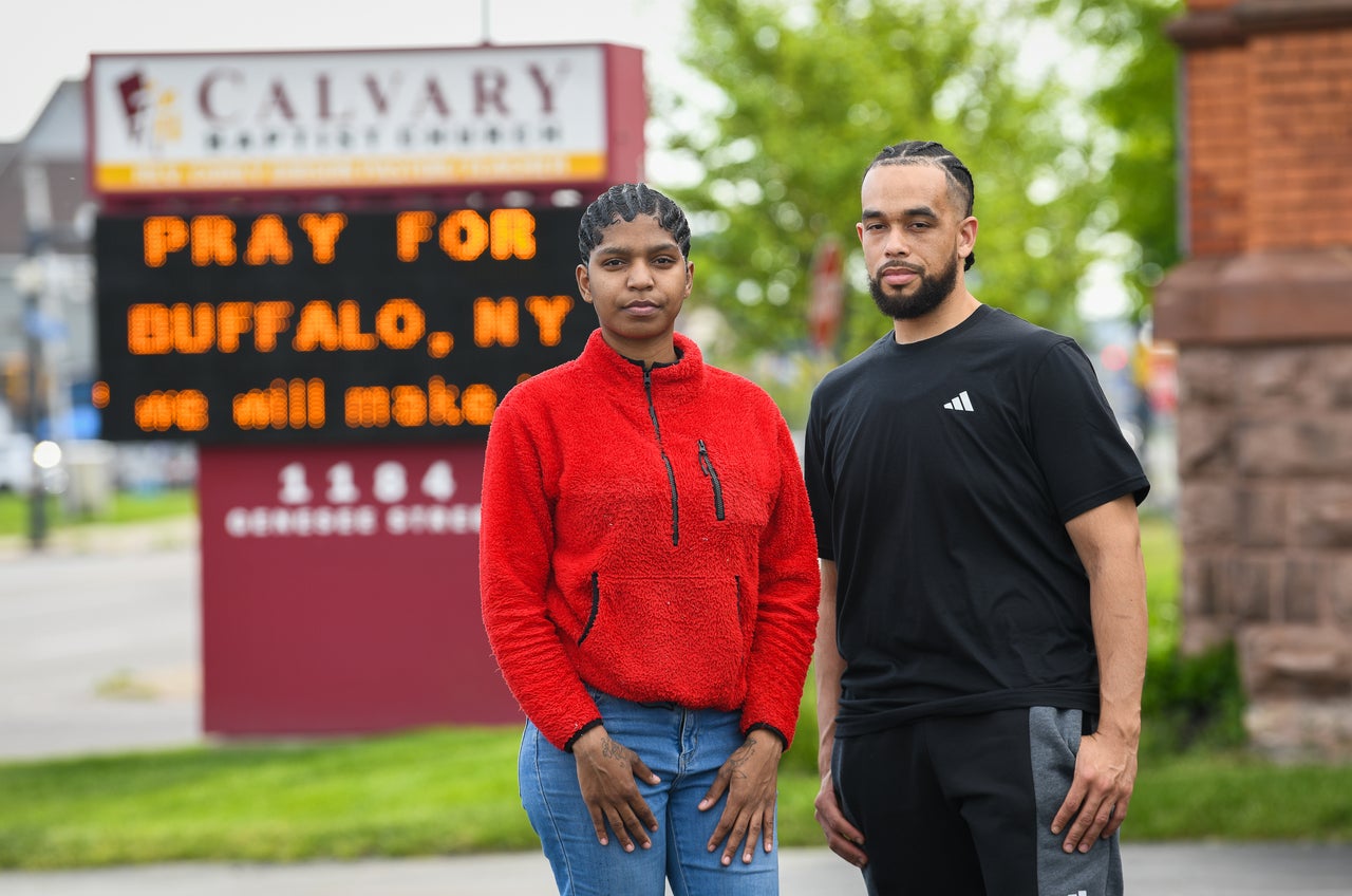 From left, Brooklyn Hough, 23, and Myles Carter, are pictured in Buffalo, N.Y., Saturday, May 13, 2023.Hough was a cashier at the Tops supermarket when the massacre that killed 10 people happened, and survived.