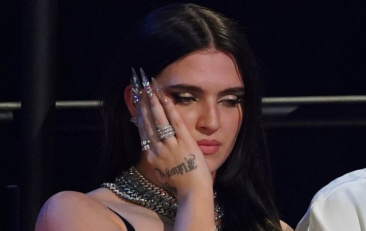 United Kingdom entrant Mae Muller reacts during voting in the grand final for the Eurovision Song Contest final