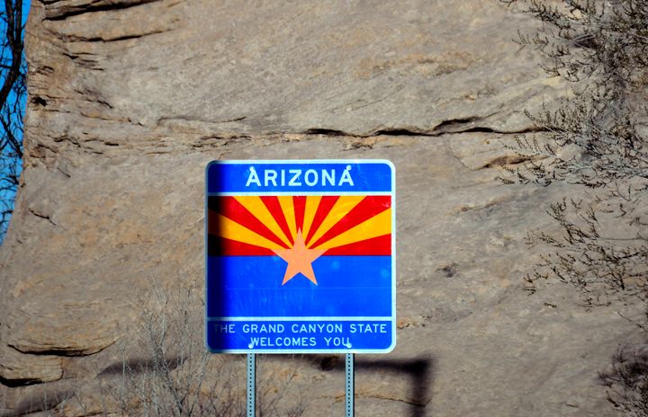 WINDOW ROCK, AZ - MARCH 18, 2017: A welcome sign greets motorists at the Arizona border near Window Rock in northeastern Arizona. (Photo by Robert Alexander/Getty Images)