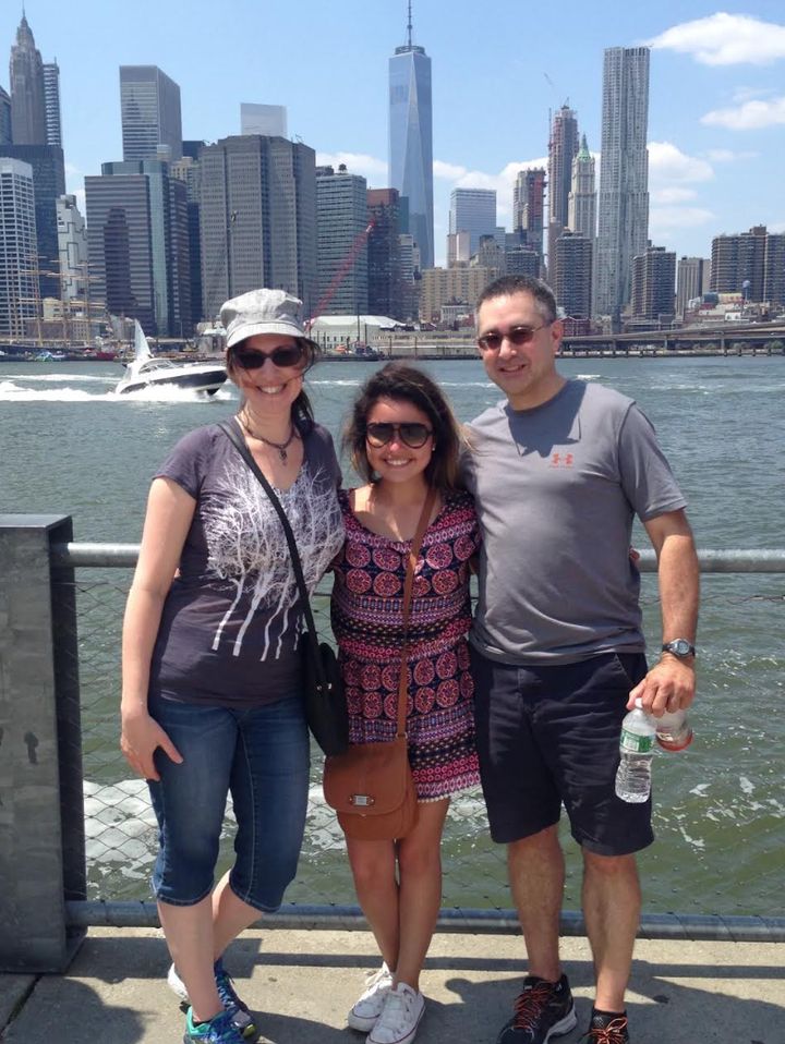 The author and her husband with Sammie on a trip to NYC after high school graduation in 2015.