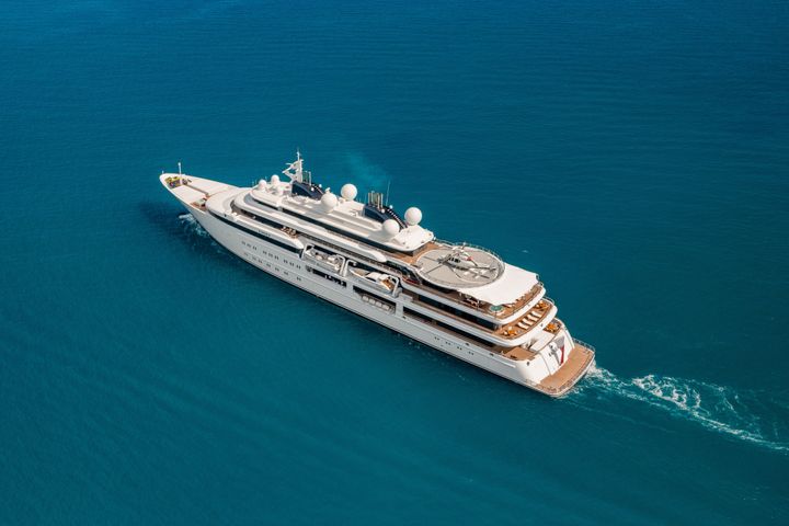 Aerial photo from a drone of the 124 meter super yacht Katara. Captured leaving Port Vauban, Antibes, Côte d'Azur, France.