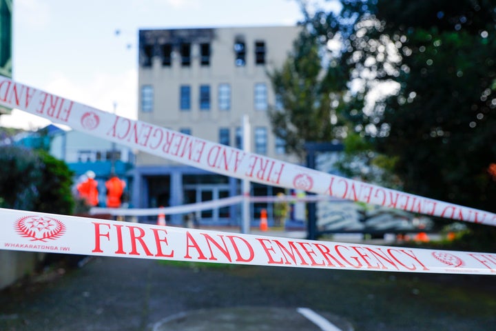 Many more are unaccounted for after a blaze broke out at a four-story hostel building in central Wellington.