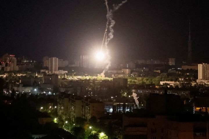 Explosion of a missile is seen in the sky over the city during a Russian missile strike, amid Russia's attack on Ukraine, in Kyiv, Ukraine May 16, 2023.