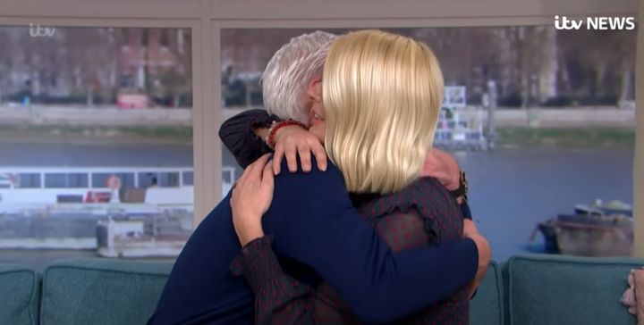 Phil and Holly share a hug as he discusses his sexuality