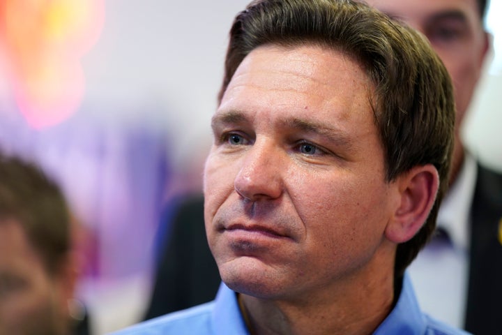 Florida Gov. Ron DeSantis greets onlookers during a fundraiser picnic for U.S. Representative Randy Feenstra, R-Iowa, Saturday, May 13, 2023, at Sioux Center, Iowa. (AP Photo/Charlie Neibergall)