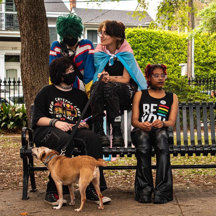 Participants listen to speakers at the Transgender Day of Visibility rally held March 31 in Washington Square Park in New Orleans.