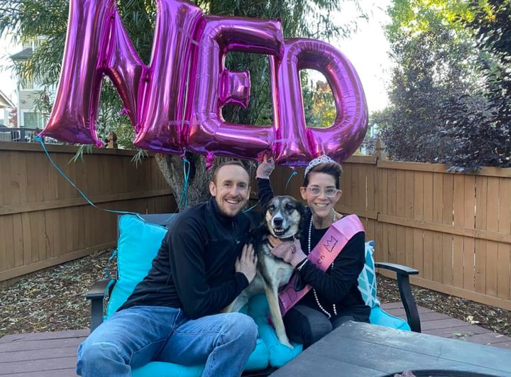 The author with Nick and their "doghter" Alice in 2021 after the author was told she had "no evidence of disease" (NED).