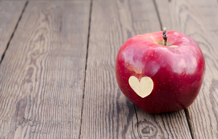 apple with a symbol heart