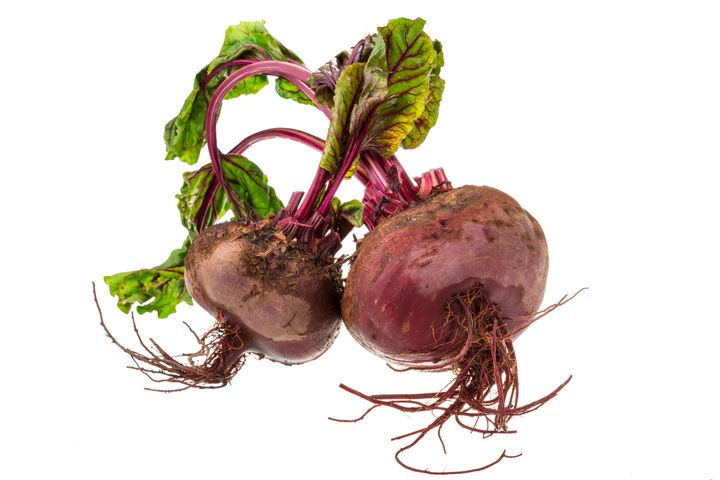 Raw beet with leaf isolated