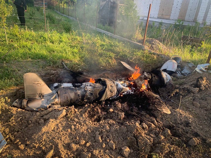 In this photo provided by the Ukrainian Police Press Office, fragments of a Russian rocket which was shot down by Ukraine's air defence system are seen after the night rocket attack in the Kyiv region, Ukraine, on May 18, 2023.