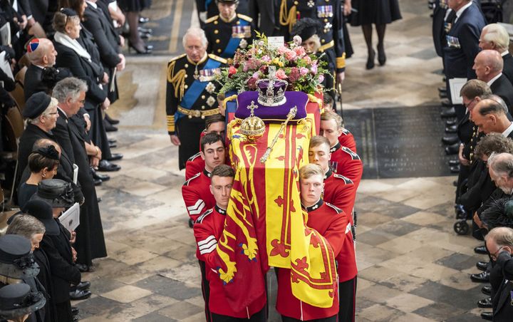 King Charles III and members of the royal family follow behind the coffin of Queen Elizabeth II in September in 2022.