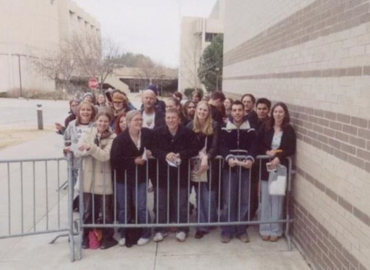 The author (front row, second from right) and Shannon Lambert (left of author) waiting with other fans to meet Tori at a meet-and-greet before a show in Green Bay, Wisconsin, in 2003.