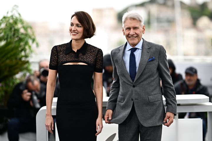 Phoebe Waller-Bridge and Harrison Ford pose during a photocall at the Cannes Film Festival 