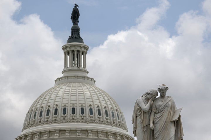 The Peace Monument with a figure of Grief weeping on the shoulder of History is seen in front of the US Capitol in Washington, DC, on May 19, 2023. Republicans have paused crunch US debt default talks less than two weeks before a potentially catastrophic default, House Speaker Kevin McCarthy said Friday, citing lack of movement from Democrats. (Photo by Mandel NGAN / AFP) (Photo by MANDEL NGAN/AFP via Getty Images)