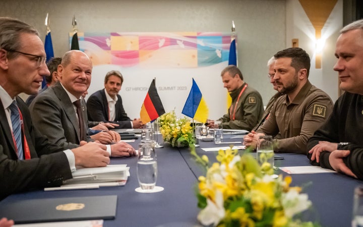 20 May 2023, Japan, Hiroshima: German Chancellor Olaf Scholz (SPD) meets Volodymyr Selenskyj President of Ukraine at the Prince Hotel on the second day at the G7 Summit. At the meeting of leading democratic industrial nations, the focus will be on the Russian war of aggression against Ukraine, dealing with China, nuclear disarmament and climate protection, among other issues. Photo: Michael Kappeler/dpa (Photo by Michael Kappeler/picture alliance via Getty Images)