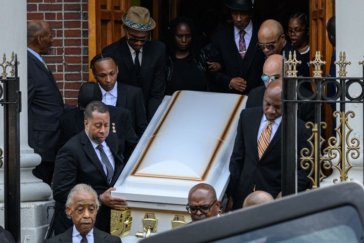 Mourners carry the casket of Jordan Neely at Mount Neboh Baptist Church after a funeral service in Harlem on Friday. Neely was widely identified as a Michael Jackson impersonator who often performed on the train.
