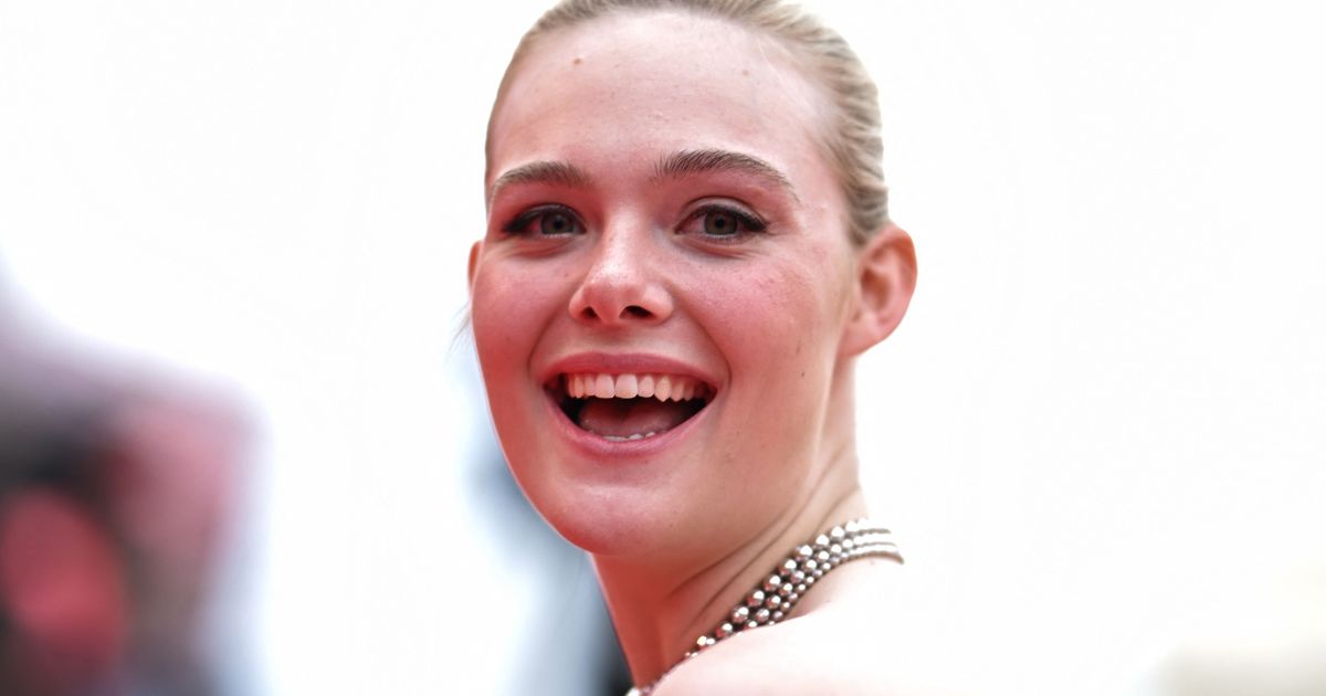 Elle Fanning Stuns In Skin-Baring Dress At Cannes Film Festival