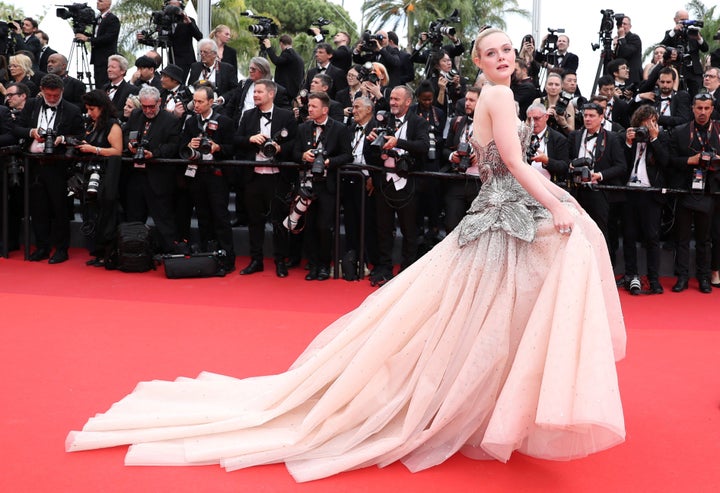 Elle Fanning Stuns In Skin-Baring Dress At Cannes Film Festival