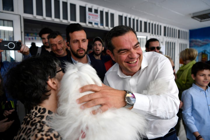 Leader of the main opposition Syriza party, Alexis Tsipras greeting his supporters at a polling station in Athens, Greece, on May 21, 2023.