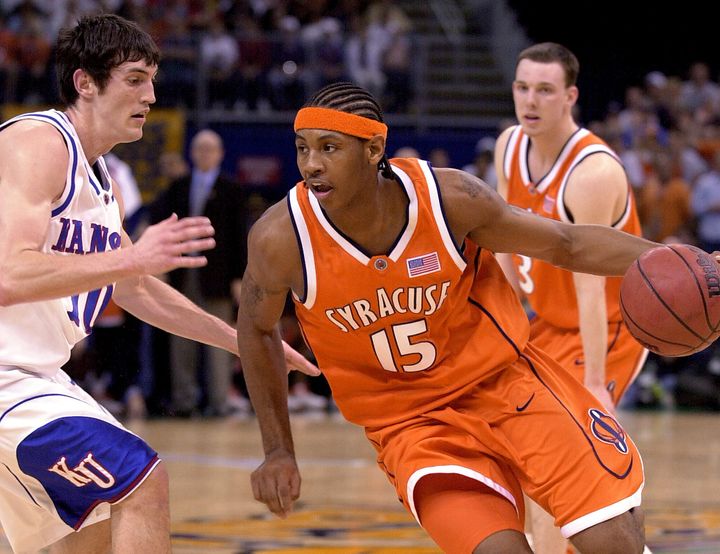 Syracuse's Carmelo Anthony (15) drives with Kansas' Kirk Hinrich (10) defending in the first half of the championship game at the Final Four Monday, April 7, 2003, in New Orleans.