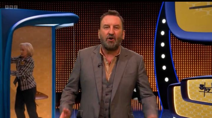 Lee Mack hosting the fictional gameshow 3 By 3