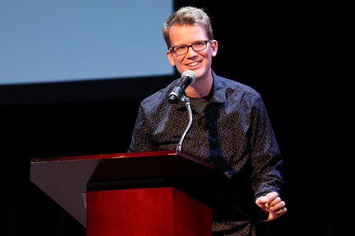 YouTube personality and author Hank Green speaks onstage as he discusses his book "An Absolutely Remarkable Thing."