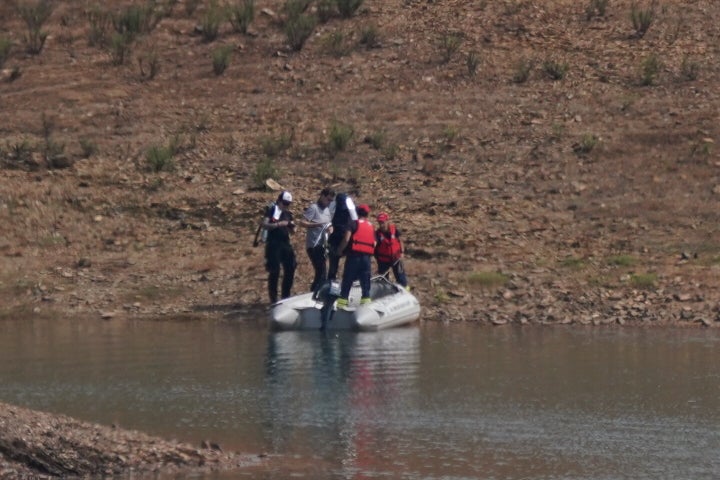 Personnel at Barragem do Arade reservoir in Portugal, as searches begin as part of the investigation into the disappearance of Madeleine McCann. 