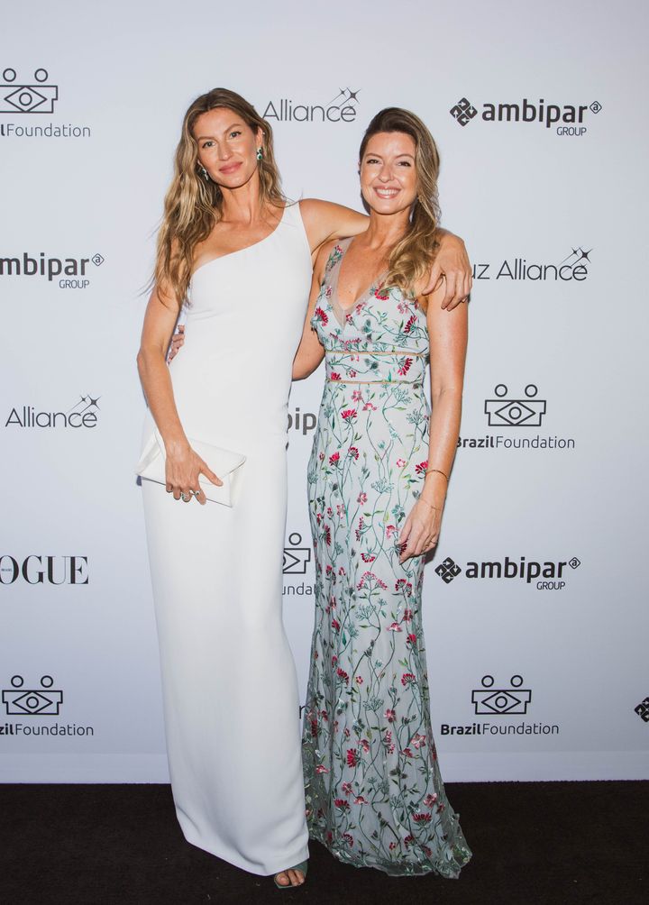 Gisele Bundchen, left, and twin sister Patricia at the Luz Alliance Gala benefiting the Brazil Foundation on May 20 in Miami.