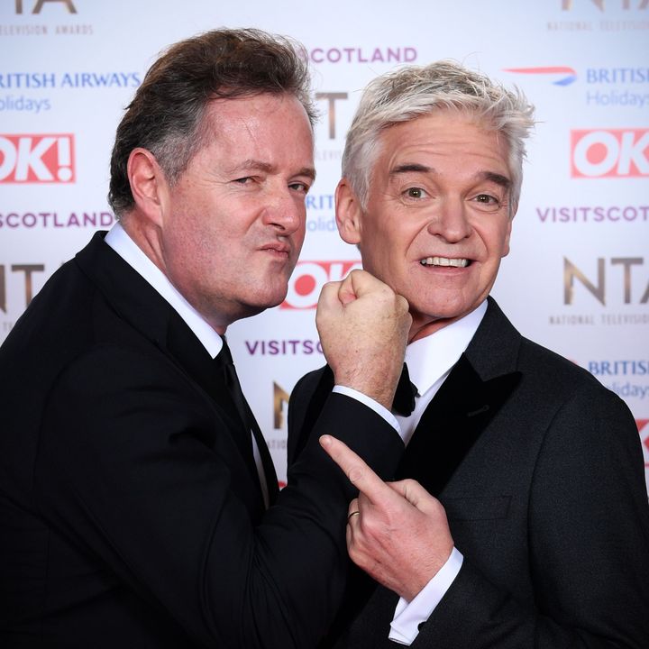 Piers and Phillip posing together at the 2019 NTAs