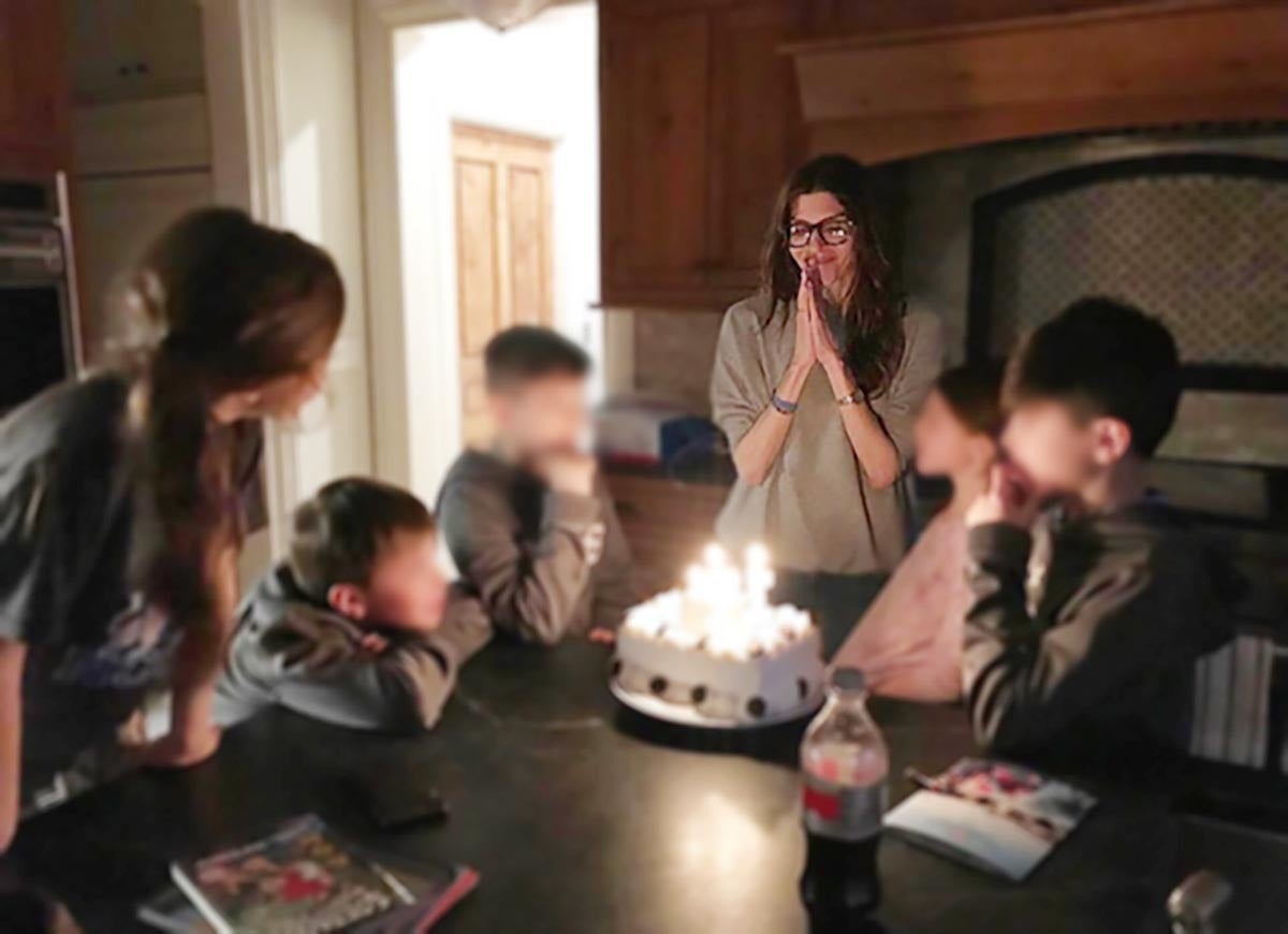 Jennifer celebrating with her children.