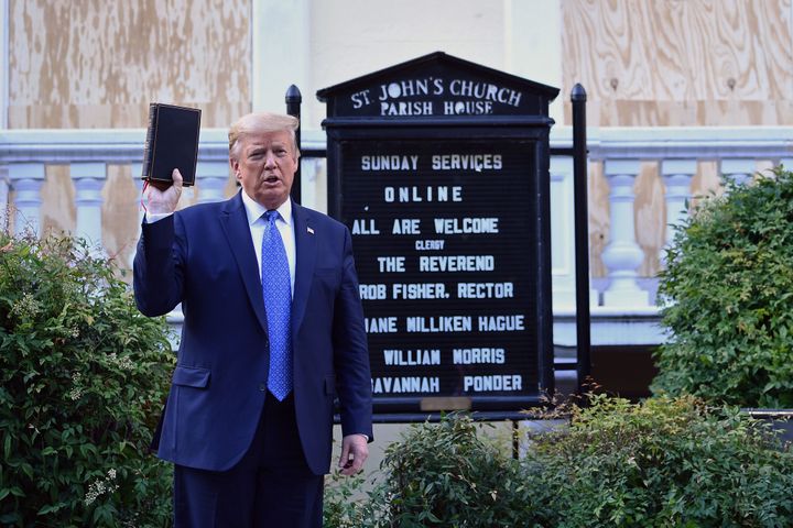 President Donald Trump holds up a Bible on June 1, 2020, outside St John's Episcopal Church across Lafayette Square from the White House after the park had been aggressively cleared of protesters.