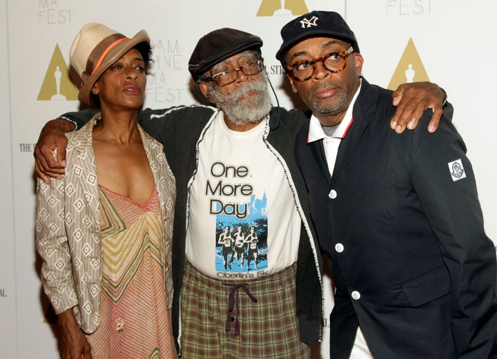 Director Spike Lee, right, his sister, screenwriter Joie Lee, left, and their father Bill Lee at a screening of "Do The Right Thing" in New York in 2014.