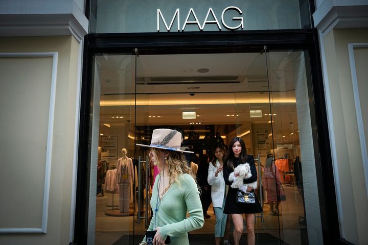 A woman exits a newly opened Maag store, a former Zara flagship store, in Moscow, Russia.