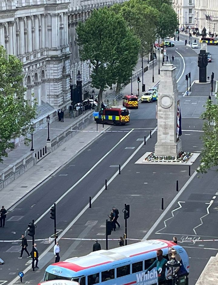 Handout taken from the Twitter feed of @TorbsTalks, of police at the scene after a car collided with the gates of Downing Street in London. 