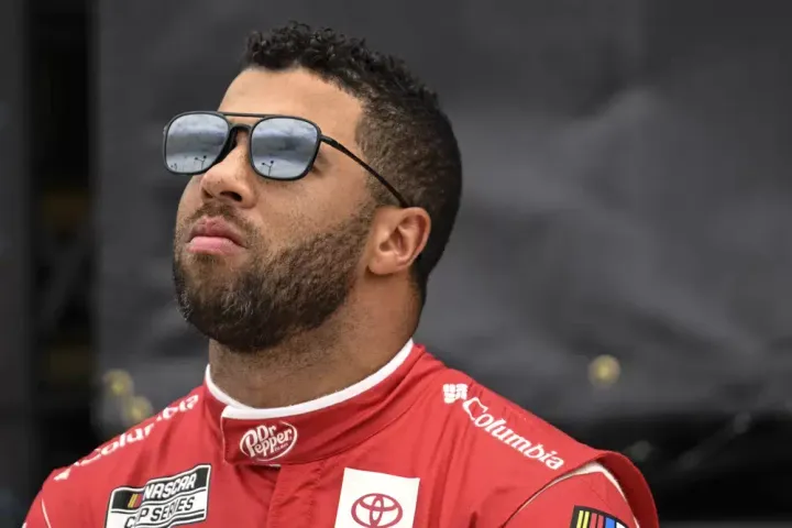 Bubba Wallace looks on prior to a NASCAR Cup Series auto race at Darlington Raceway, Sunday, May 14, 2023, in Darlington, S.C.