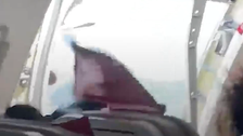 Caught On Camera: Terrifying Moment After Plane Passenger Opens Door Mid-Air Caught On Camera: Terrifying Moment After Plane Passenger Opens Door Mid-Air