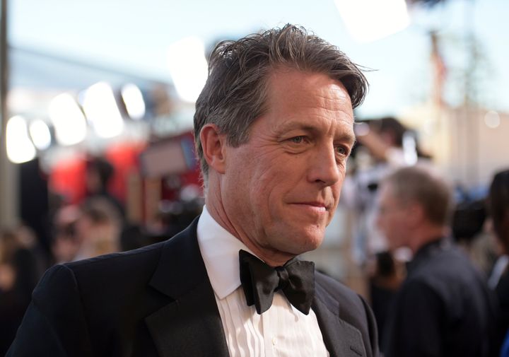 A London court on Friday rejected an attempt by the publisher of The Sun tabloid to throw out a lawsuit by actor Hugh Grant alleging that journalists and investigators it hired illegally snooped on him.