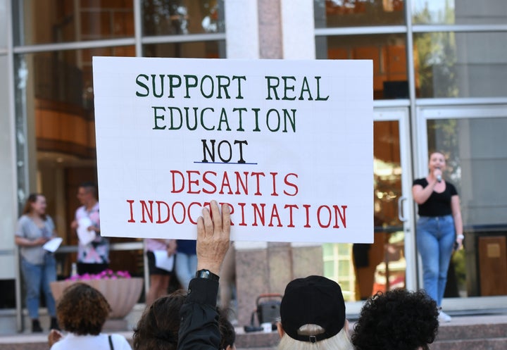 Students and others attend a walkout on April 21 outside Orlando City Hall to protest Florida education policies.