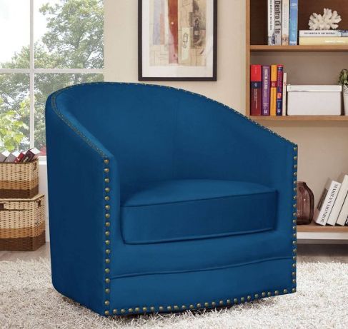 A studded swivel chair for a cozy reading session
