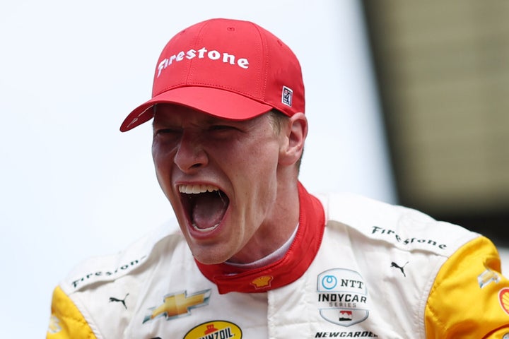 Josef Newgarden celebrates in victory lane after winning the 2023 Indianapolis 500 at Indianapolis Motor Speedway on May 28. (Photo by James Gilbert/Getty Images)