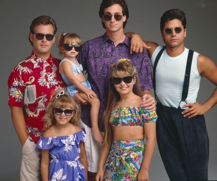 The Full House cast: Dave Coulier, Jodie Sweetin, Mary-Kate/Ashley Olsen, Bob Saget, Candace Cameron and John Stamos.
