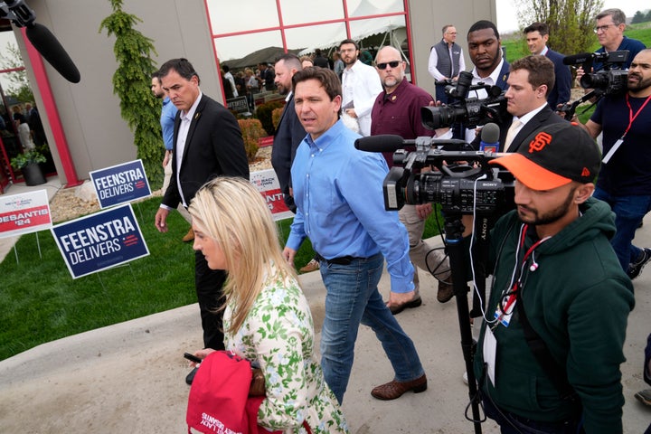 Florida Gov. Ron DeSantis, center, leaves a fundraising picnic for Rep. Randy Feenstra, R-Iowa, May 13, 2023, in Sioux Center, Iowa. In the coming weeks, at least four additional candidates are expected to launch their own presidential campaigns, joining a field that already includes DeSantis, Sen. Tim Scott, R-S.C., former U.N. Ambassador Nikki Haley, former Arkansas Gov. Asa Hutchinson, tech billionaire Vivek Ramaswamy and several longer-shots like conservative talk radio host Larry Elder. (AP Photo/Charlie Neibergall, File)