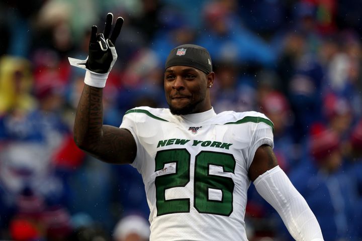 Le'Veon Bell of the New York Jets signals to fans before a game against the Buffalo Bills in 2019.