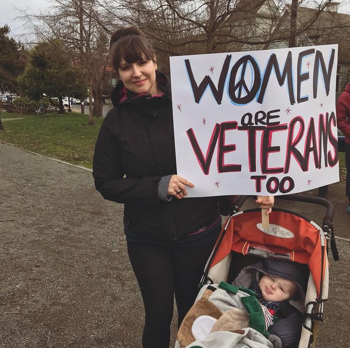The author with her son Ernie at the Seattle Women's March (2018).
