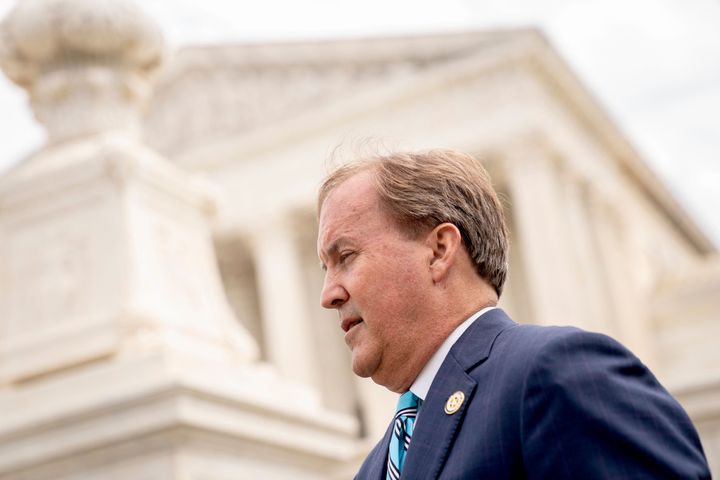 Texas Attorney General Ken Paxton speaks to reporters in front of the US Supreme Court in Washington, DC, on April 26, 2022.